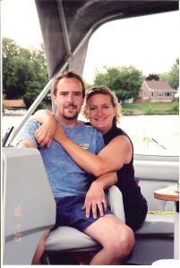Me and my hubby, enjoying a ride on our pontoon boat. 